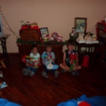 The grandkids, patiently waiting to open stockings on christmas morning! Super cute.