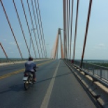 Roads in Vietnam are in great shape, and they seem to love big suspension bridges. The cool thing about biking the Mekong delta is you get to cross tons of bridges every day, big and small. Helps keep the scenery interesting, in an otherwise flat landscape.