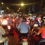 Traffic jam, from the back of a motorbike downtown Saigon.
