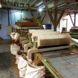 Then, the withered, fermented leaves are dried in an over for about half an hour, and separated again by size in these machines. Each of these sacks has a different size of tea leaf, from tiny dust, up to the full-sized orange pekoe.
